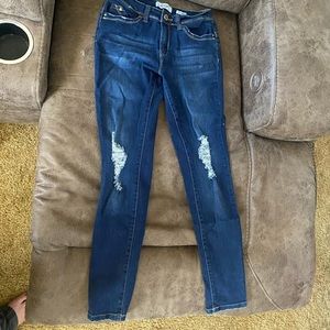 dark blue mid-rise ripped jeans